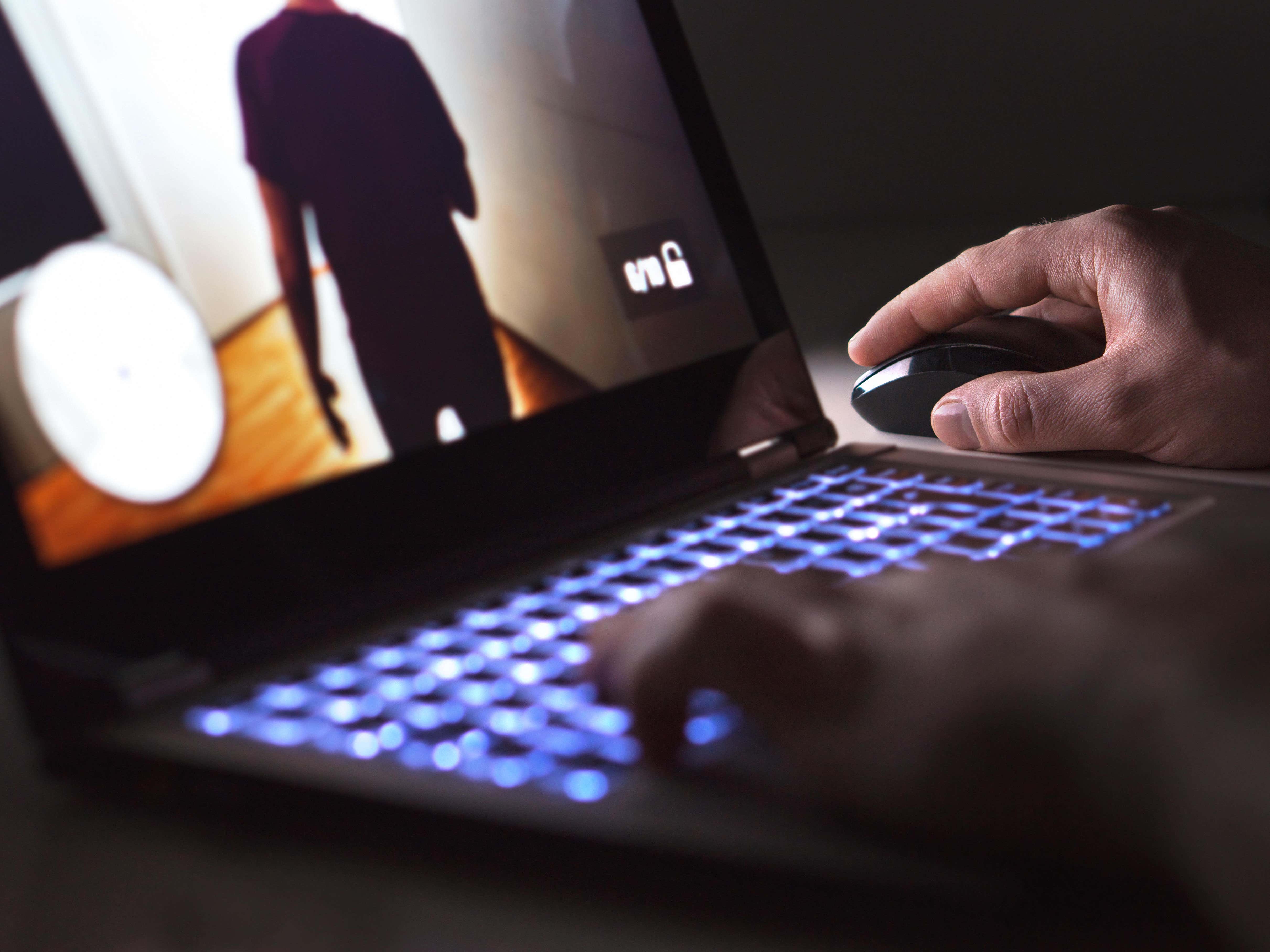 A young man using a laptop