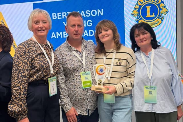 Stephanie Keating, Lions District Young Ambassador Award Officer; Caitlin Tierney with her parents Breda and Michael