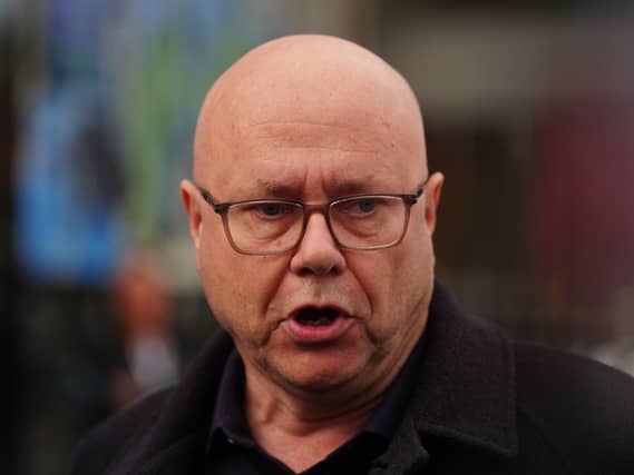Headshot of Kevin Callinan speaking