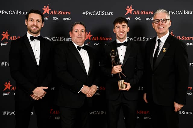 Mayo footballer Enda Hession is presented with his PwC GAA/GPA All-Star award by, from left, Gaelic Players Association chief executive Tom Parsons, PwC managing partner Enda McDonagh and Uachtarán Chumann Lúthchleas Gael Jarlath Burns during the 2026 PwC GAA/GPA All-Star Awards at the RDS in Dublin. Pic: Seb Daly/Sportsfile