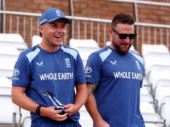 Sam Curran, left, and Brendon McCullum at England training