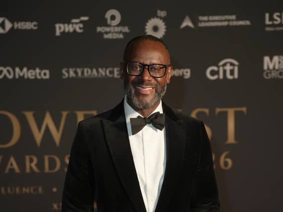 Ian Thomas smiling at a gala event
