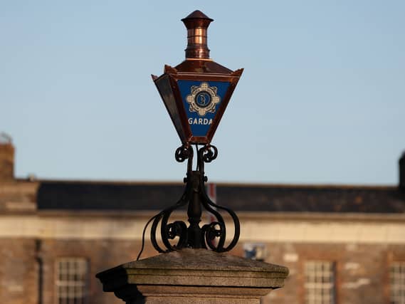 The Garda logo on a lamp at the entrance to Garda Headquarters in the Phoenix Park, Dublin