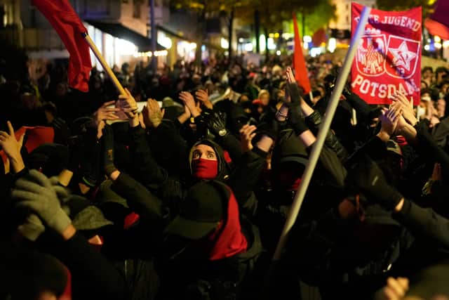 Demonstrators in Berlin (Ebrahim Noroozi/AP)
