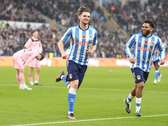 Coventry’s Jack Rudoni (centre) celebrates scoring