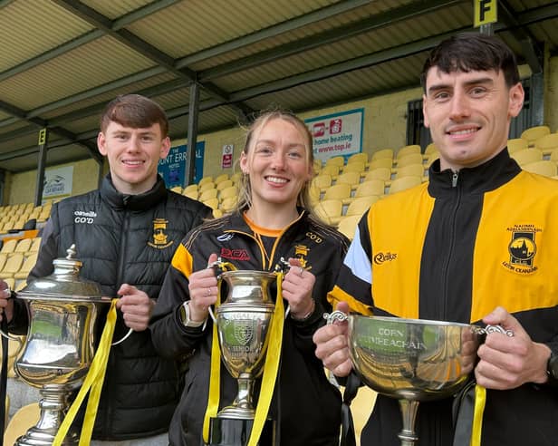 Conor, Ciara and David O'Donnell with the championship trophies they won this season