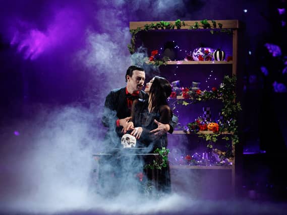 Delta Goodrem and Kai Widdrington dressed as Morticia and Gomez Addams for the dance