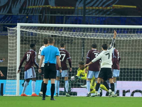 Aston Villa goalkeeper Zion Suzuki scores an own goal