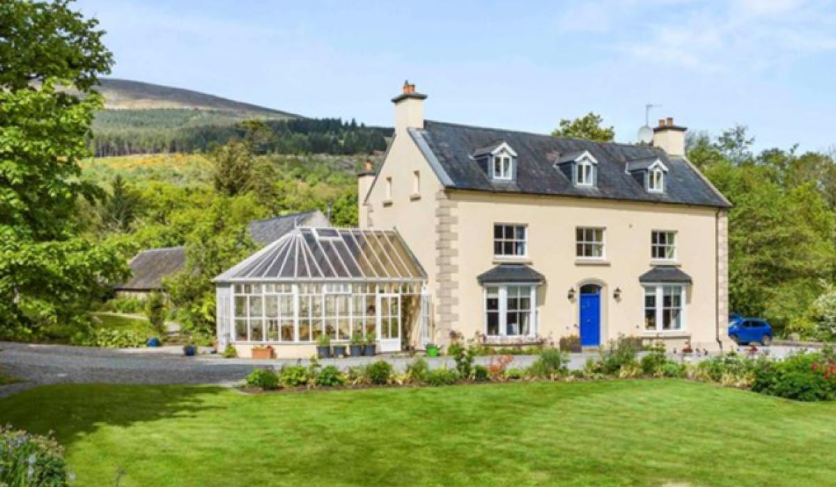 Stunning property on acres of land with river frontage for sale in