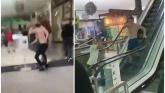 Shoppers shocked as mop is used in bare-chested brawl inside Irish shopping centre