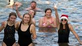 In pictures: Brrrrrrr-ave dippers take to Creevy Pier on Christmas morning