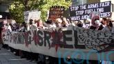 Three arrested after protest outside defence event