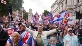 Police ‘assaulted’ as thousands of Tommy Robinson protesters descend on London
