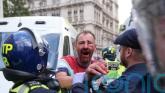 Police ‘assaulted’ as thousands of Tommy Robinson protesters descend on London