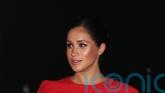 Duchess of Sussex attends Paris show of fashion designer Pierpaolo Piccioli