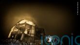 Haunting image of hyena in ghost town wins Wildlife Photographer of the Year