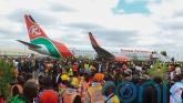 Kenyan police fire at mourners as violence erupts at viewing of body of ex-PM