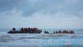 Migrants boarded small boat to UK, leaving others behind with deflated dinghy