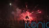 Fireworks and stones thrown at police for second night at asylum seeker hotel