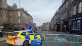 Two marked police vehicles involved in four-vehicle crash