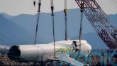 Main wreckage recovered from sea after cargo plane crash