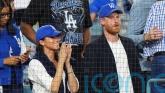 Harry and Meghan cheer on the Los Angeles Dodgers from front row seats