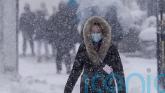 Travel ban and blizzard warnings as major storm hits north-east US