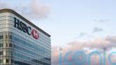 HSBC to meet &pound;1.1bn cost savings target early after cutting back senior roles