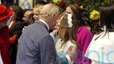 Former Spice Girl plants a kiss on the King at Commonwealth Day service