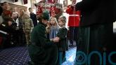 Kate delights little girl as she celebrates St Patrick&rsquo;s Day with Irish Guards