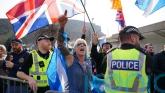Police keep opposing groups apart as anti-immigration rally held at Holyrood