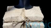 Life jacket used by Titanic survivor sells for &pound;670,000 at auction