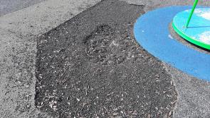 Large holes and missing equipment at playground in Offaly
