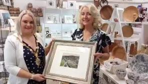 Watch: Mayor presented with iconic Derry Girls artwork