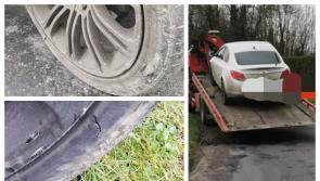 Laois garda&iacute; got a grip on this baldy driver in Portlaoise