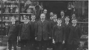Can you help identify the presumed Kilkenny business and people in this picture? 