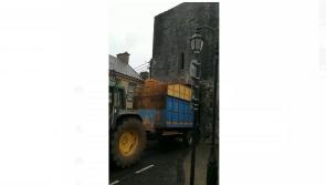 WATCH: Tractor and trailer get stuck in medieval archway in Limerick town