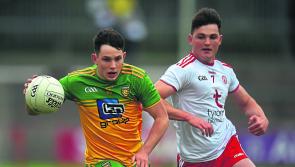 Caolan McColgan in action for Ulster University in narrow defeat to Queen's