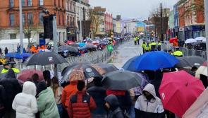 People braving the rain waiting to welcome President Joe Biden to Dundalk