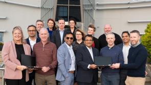 Senior TCS cybersecurity executives visit Letterkenny and present laptops to schools