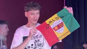 Social media baffled at Lithuanian Eurovision Contestant holding up a Carlow flag 