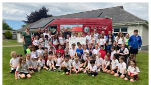 PICTURES: The Mile Marker committee hands over cheque for &euro;10,000 to Danesfort National School