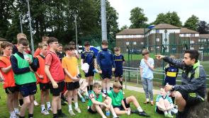 Celtic coaches teaching Don Boscos youngsters the values of the game