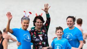 IN PICTURES: Derry swimmers take festive plunge in Lisfannon on Christmas Day