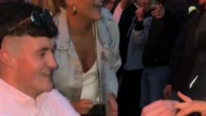 WATCH: Tipperary couple steal the show at Zach Bryan concert with adorable proposal!