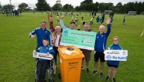 Tadhg and Derry Fleming celebrate €2,000 Buncrana Hearts Re-turn winners


