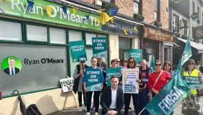 Local TD stands in support with striking school secretaries and caretakers