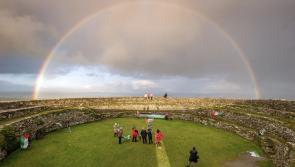 Spectacular sunrise rainbow for Palestine group at Grianán of Aileach equinox ceremony 