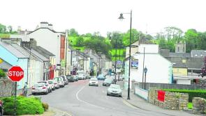 'Back of cars sticking out onto road' due to uneven buildings in Leitrim town 