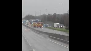 Emergency services at scene of two-vehicle collision on busy Limerick road